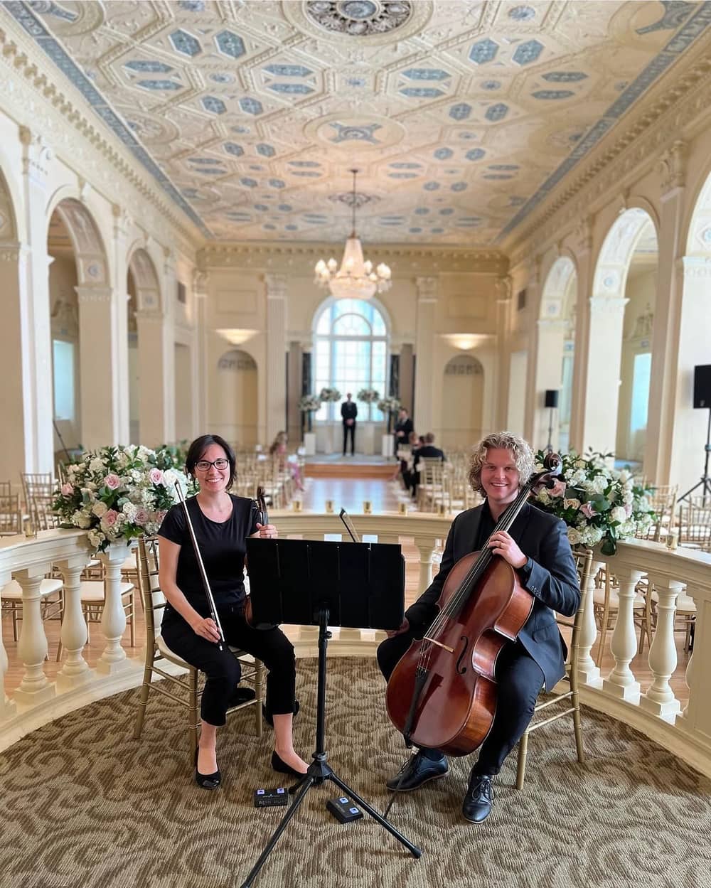 Lumina String Duo performing at a wedding ceremony at Biltmore Ballrooms, Atlanta