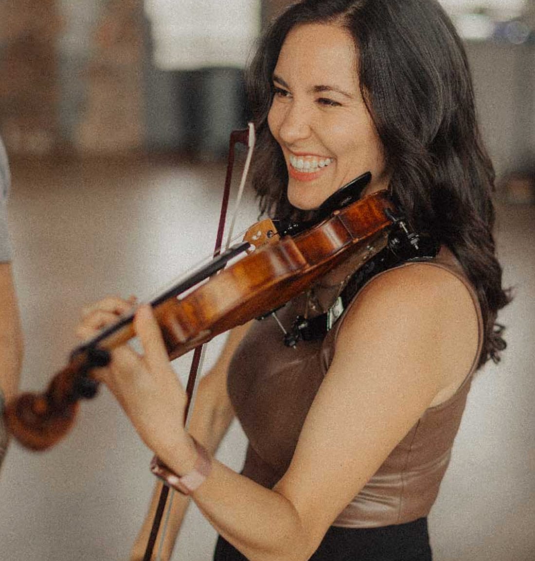 Rosie Riquelme, founder and lead violinist of Lumina String Ensemble